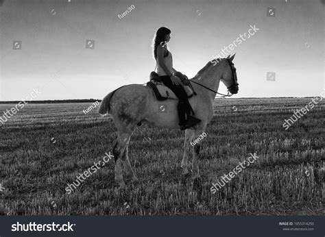 Young Woman Mounting Astride Stock Photo 1055314250 Shutterstock