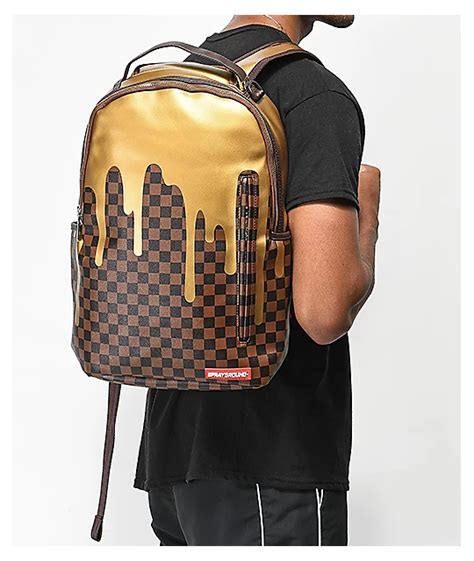 Sprayground Checkered Gold Drips Backpack The Art Of Mike Mignola