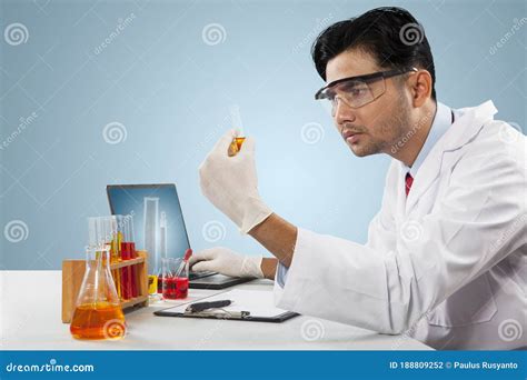 Male Researcher Hold Test Tube And Experimenting Stock Photo Image Of