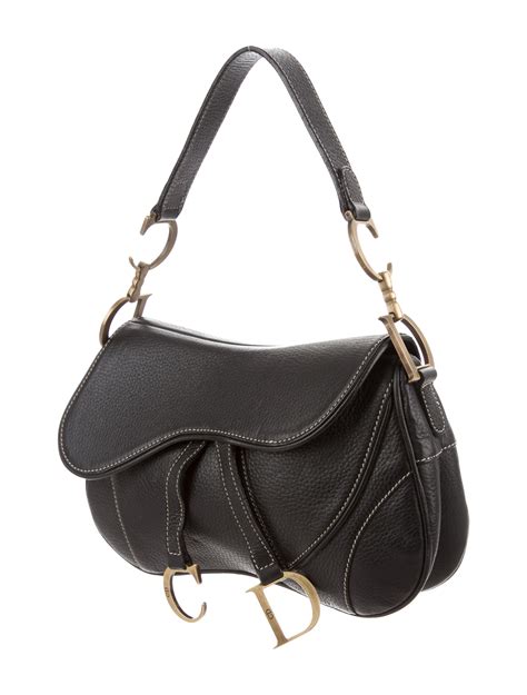 A medical bag (doctor's bag, physician's bag) is a portable bag used by a physician or other medical professional to transport medical supplies and medicine. Lyst - Dior Leather Saddle Bag Black in Metallic