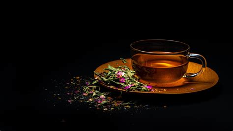 A quick video for today, of a cup of flowering tea. Download wallpaper 3840x2160 cup, tea, flowers, leaves ...
