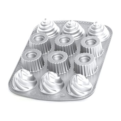 If you don't have baking cups, grease or spray your cupcake pan with nonstick cooking spray; Nordic Ware Pro Cast Filled Cupcakes Pan