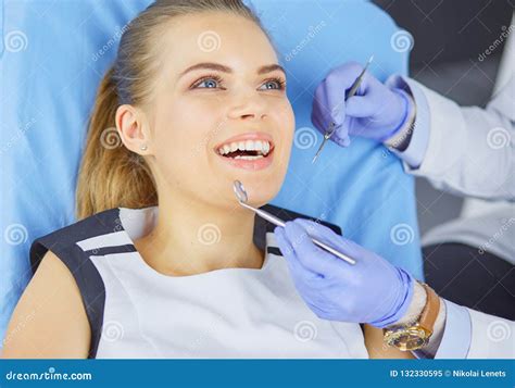 Beautiful Girl In The Dental Chair On The Examination At The Dentist Stock Image Image Of