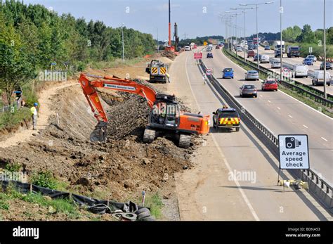 M25 road widening project with contra flow in operation Stock Photo - Alamy