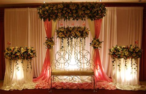 The initial step in any wedding decoration is to select a theme. Vismaya: Wedding Settee backs