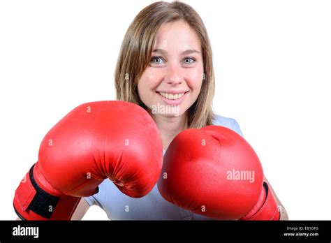 A Pretty Young Girl With Red Boxing Gloves On The White Background