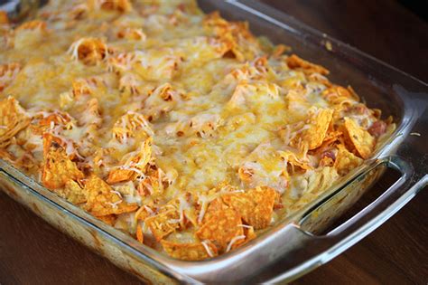 This creamy chicken casserole is loaded with cream cheese, corn, shredded cheddar and topped with crumbled doritos. Dorito Chicken Casserole Recipe - BlogChef