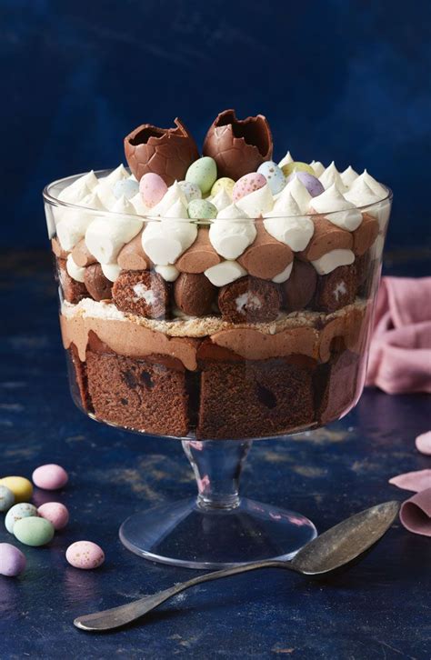 The ultimate easter dessert, this brilliantly boozy trifle features six stunning layers of toasted hot cross buns, caramelised fruit, salted caramel, mascarpone, custard and soft whipped cream. Chocolate Easter trifle | Recipe | Easter chocolate, Chocolate mini rolls, Almond recipes