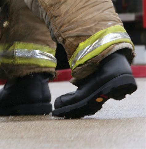 A Firefighters Boots And Pants On The Ground