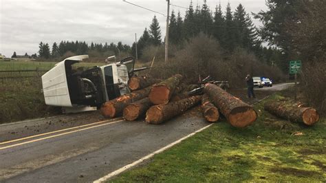 Truck Spills Logs All Over Road Near Portland Photos