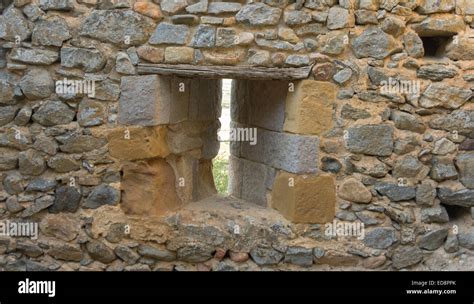 Loophole Into The Stone Walls Of A Medieval Castle Stock Photo Alamy