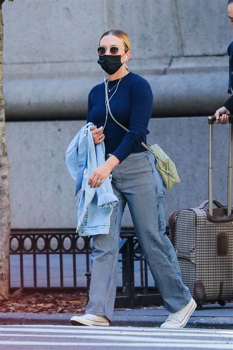 Scarlett Johansson Wears A Face Mask With A Blue Sweater And Striped