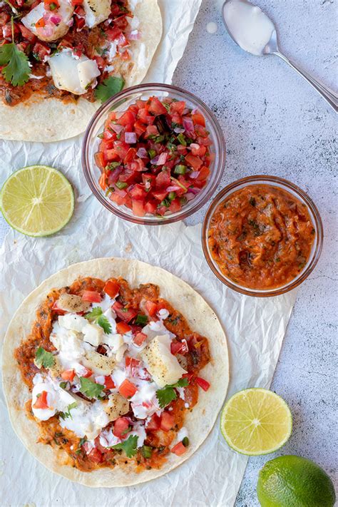 Top each with desired amount of corn salsa, cabbage and queso fresco. Grilled Fish Tacos with Roasted Tomato Salsa | Heavenly ...