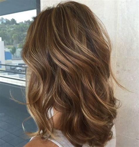 Medium dark brown hair with highlights is a outstanding option for you to try. 30 Caramel Highlights For Women To Flaunt An Ultimate ...