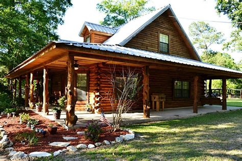 Extending to at least two sides of the home, wraparound porches provide generous amounts of space to host and entertain guests when the weather is favorable. Building Log Cabin Homes with Wrap around Porch in 2020 ...