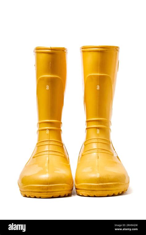 Pair Of Yellow Rubber Boots For Kids Isolated On White Background Front