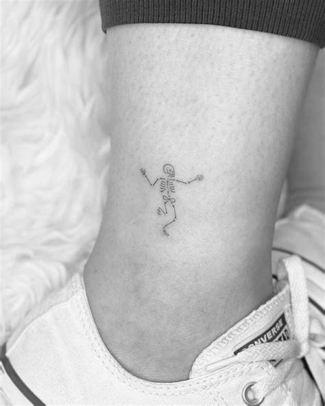 Fine Line Dancing Skeleton Tattoo On The Ankle