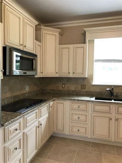 White kitchen cabinets offer the most timeless look and the one you'd least dear farmhouse kitchen, black and white tile is a pretty classic look and i think you can pull it off with the i want to paint my kitchen cabinets white but not sure on the color. 65+ Classy Farmhouse Gray Kitchen Cabinets Decor Ideas ...