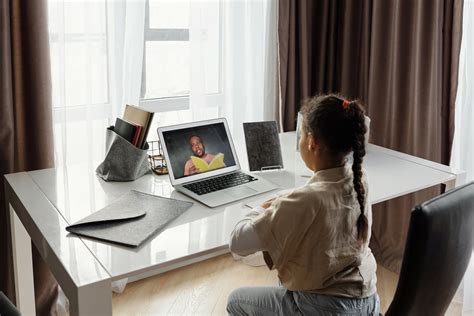 Little Girl Taking Online Classes · Free Stock Photo