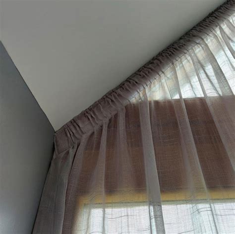 How To Hang Curtains On Apex And Angled Windows Voila Voile