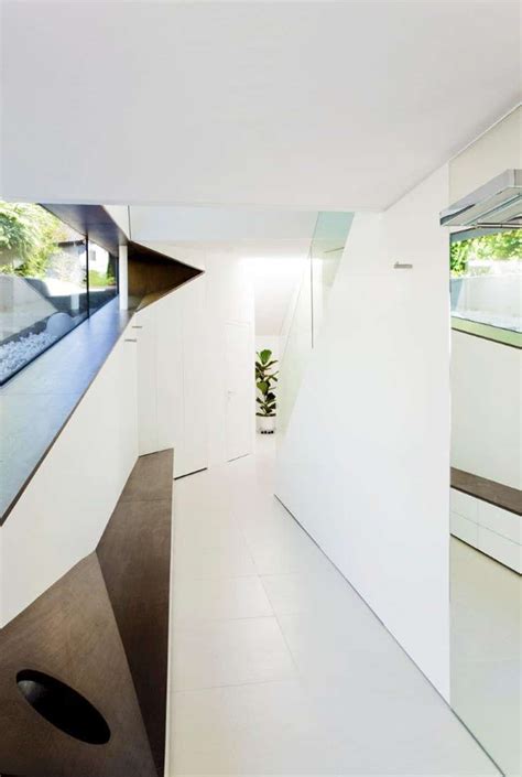 Slope Roof House With Futuristic Interiors