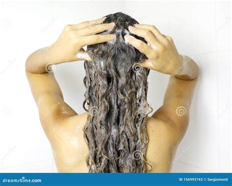 Young Woman In Shower Washing Hair With Shampoo Beautiful Woman