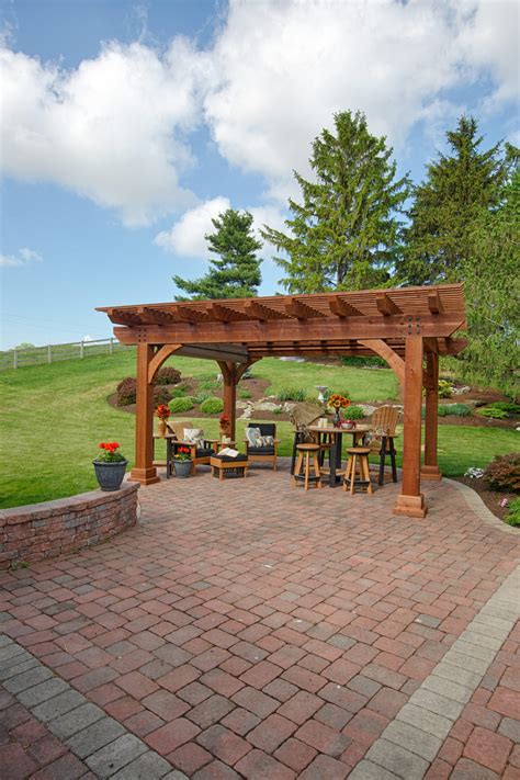 Cue the citronella candles and tiki torches! 4 Pergola Ideas for Your Backyard Oasis | Country Lane Gazebos