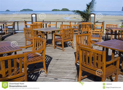 The table serves as the focal point of ceremonial remembrance, originally growing out of us concern of the vietnam war pow. Table And Chairs In Empty Cafe Stock Photo - Image of ...