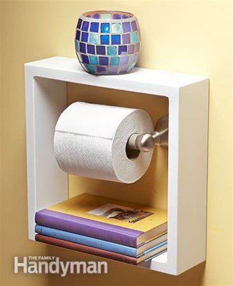 Toilet paper holder and storage to hold small flower vases for a beautiful bathroom look. Clever Toilet Paper Storage or Holder Ideas - Hative