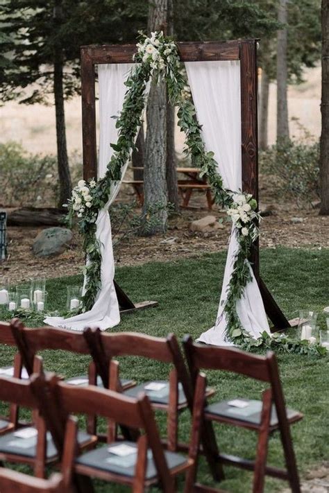 Chic Rustic Outdoor Wedding Arch With Eucalyptus Garland And Flowers