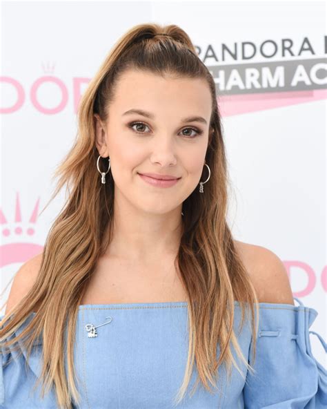 Millie bobby brown had the perfect reaction to david harbour teasing stranger things spoilers. MILLIE BOBBY BROWN at Pandora Me Charm Academy in New York ...