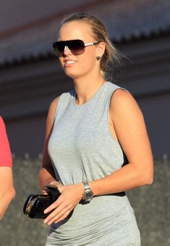 Tennis pro caroline wozniacki is pregnant, expecting her first child with husband, david lee. Retro Bikini: Caroline Wozniacki Wears Grey Mini Dress At ...