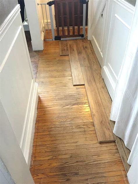 Install the last row of laminate flooring, stopping 1/2 inch from the bottom edge of the patio doors. Installing Our New Laminate Flooring - The Creek Line ...