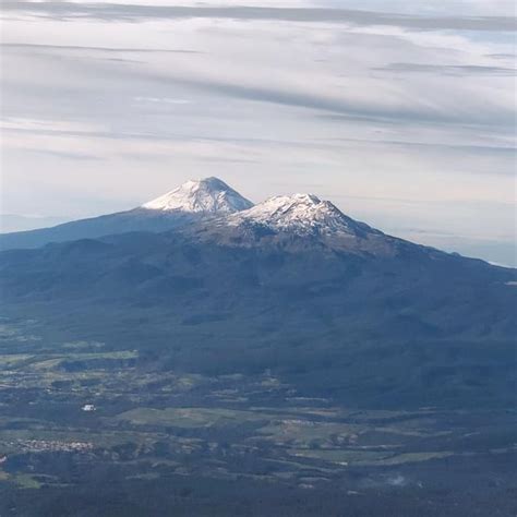 Iztaccíhuatl Volcano In Mexico View From Mexico City Rvolcanoes