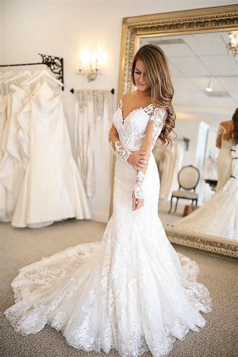 Cascading bouquets wrapped in ribbon. Plunging V-neckline Tulle Mermaid Wedding Dresses Lace ...