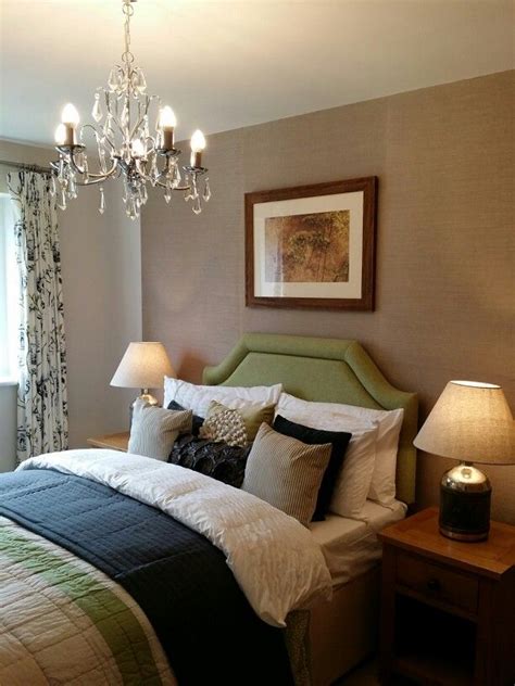 Wallcoverings are made to be washable, perfect for commercial use. Green upholstered head board with textured neutral ...