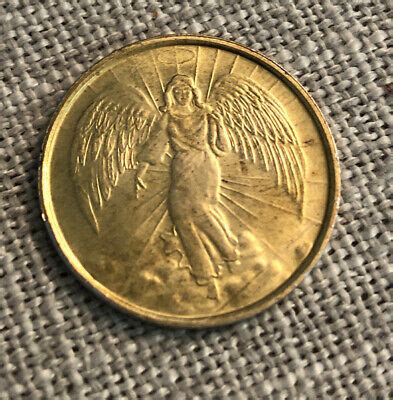 These coins have changed over the centuries and are carried as coins of protection by those who believe that guardian angels watch over them throughout their daily lives. VINTAGE RELIGIOUS GOLD ANGEL COIN DOUBLE SIDED METAL VERY NICE | eBay