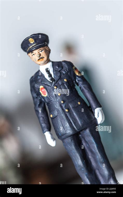 Tiny Miniature Vintage Policeman Figurine Standing Stock Photo Alamy