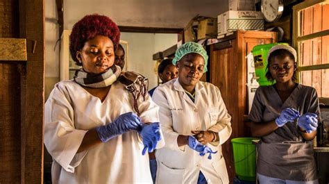 Key moments in the medical personnel at an ebola treatment centre in monrovia disinfect people who have brought in. Ebola outbreak 2014-2016: Effects on other health services