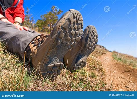 Closeup Of Hiker Legs Wearing Trekking Boots Royalty Free Stock Image