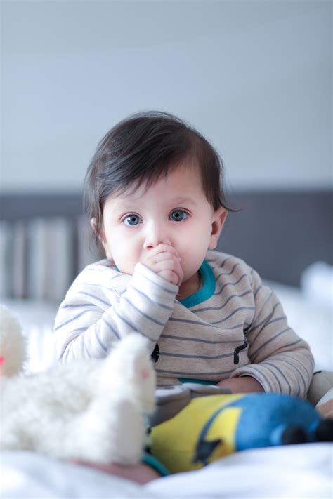 The faded hairstyle with a side part is one of the cutest ways to style your toddler's hair. Free Images : adorable, baby, big eyes, child, cute, innocence, kid, little, person, portrait ...