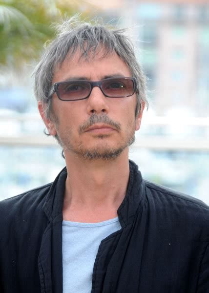 Leos carax stands alone outside the london hotel, smoking cigarettes with grim resolve and dearly wishing he were somewhere else or someone else, whatever comes easier. Leos Carax | Celebrities lists.