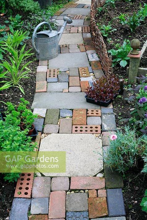 Cottage Garden Style Path Made With Salvaged Materials Including Slabs Bricks Concrete Block