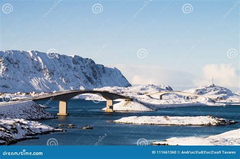 Bridge And Snow Covered Roads And Peaks In Lofoten Wintertime Norway