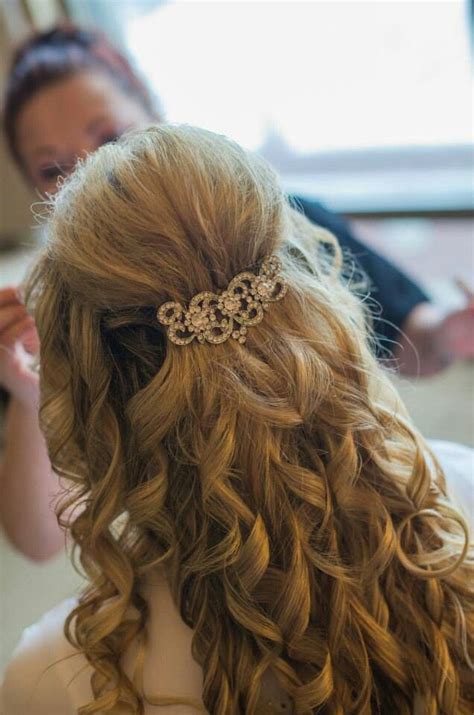 A braided and messy updo with curls is a chic idea, a rhinestone hair vine will make it amazing. Brides hair. Half up. Curly long hair | Bride hairstyles ...
