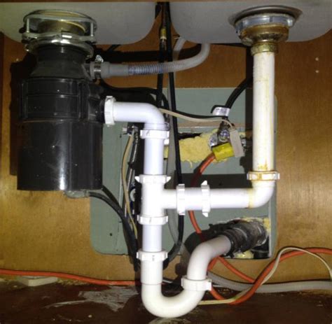 Many people who once believed that calling in a plumber was the only way to move a kitchen sink, install a faucet, or connect to copper pipe have discovered that it doesn't always have to be hard. garbage disposal layout - does this look right ...