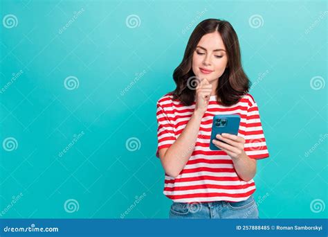 photo of funny thoughtful girl dressed red t shirt arm chin reading modern gadget empty space
