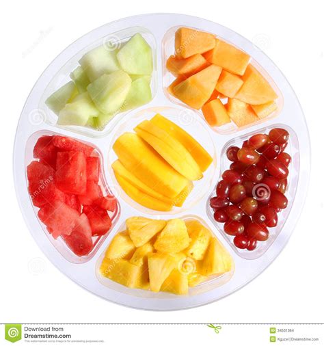 Fresh Pieces Of Fruits In Plastic Container Isolated On White Stock