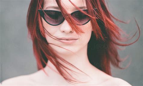 woman with red hair by stocksy contributor alexey kuzma stocksy