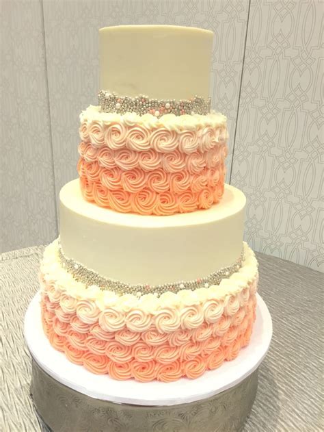 Silver And Coral Buttercream Wedding Cake With Gorgeous Rosettes And
